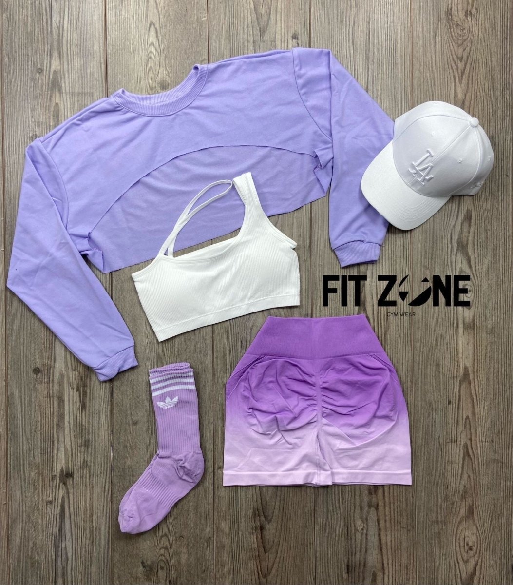 Mujer con conjunto deportivo short sin costura degradado de Fit Zone